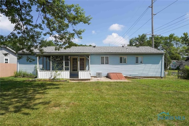 601 Edith Ave, Findlay, OH 45840 - rear view of house featuring a sunroom and a shingled roof