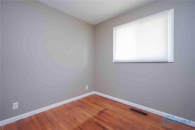 601 Edith Ave, Findlay, OH 45840 - empty room featuring baseboards and wood finished floors
