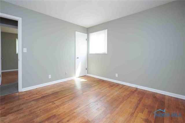 601 Edith Ave, Findlay, OH 45840 - unfurnished room featuring baseboards and hardwood / wood-style flooring