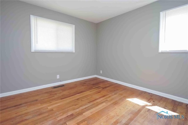 601 Edith Ave, Findlay, OH 45840 - empty room featuring light wood-style flooring and baseboards