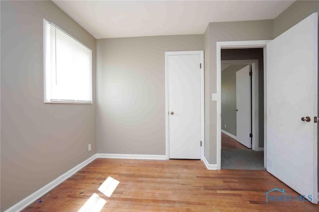 601 Edith Ave, Findlay, OH 45840 - unfurnished bedroom with light wood-type flooring