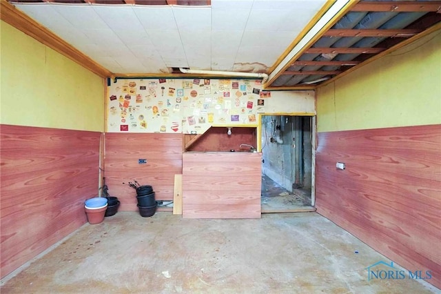 601 Edith Ave, Findlay, OH 45840 - miscellaneous room featuring unfinished concrete floors and a workshop area