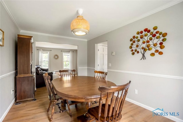 2838 Long View Dr, Maumee, OH 43537 - dining area featuring light wood-style floors and crown molding