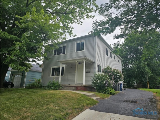 2916 Upton Ave, Toledo, OH 43606 - traditional-style home featuring a front yard