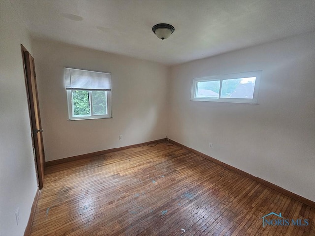 2916 Upton Ave, Toledo, OH 43606 - empty room with plenty of natural light and wood-type flooring
