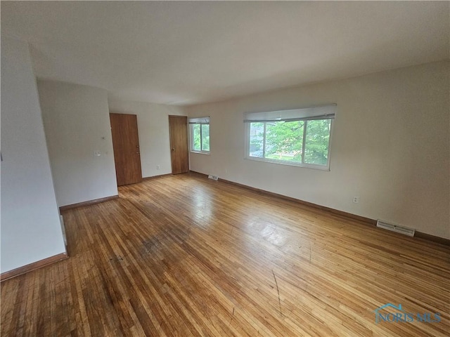 2916 Upton Ave, Toledo, OH 43606 - unfurnished room featuring hardwood / wood-style flooring and baseboards