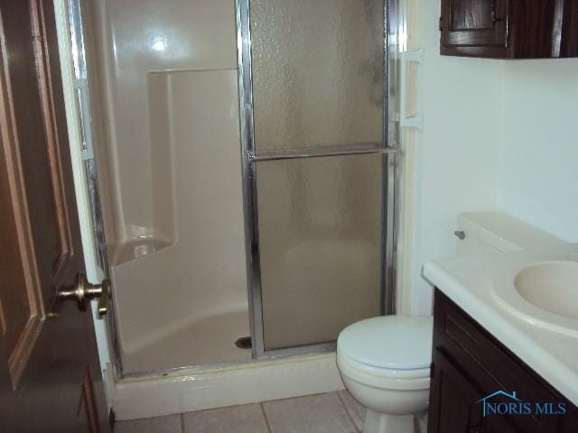 217 Lakeview Dr, Bryan, OH 43506 - full bathroom with a shower stall, tile patterned flooring, and vanity