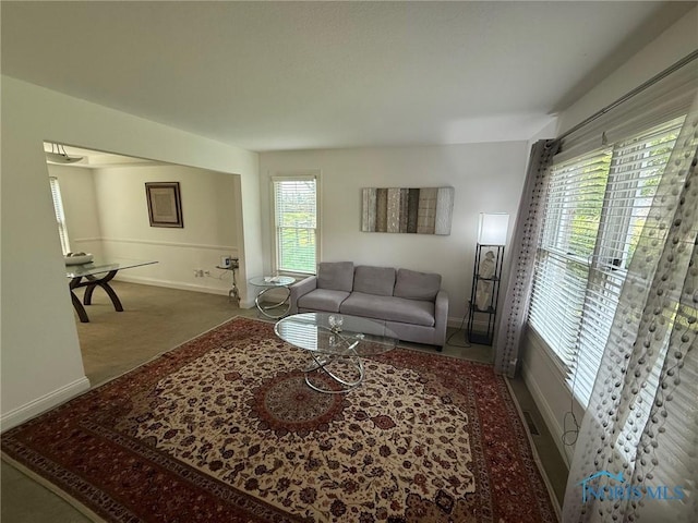 9151 Rolling Hill Rd, Holland, OH 43528 - carpeted living area featuring baseboards