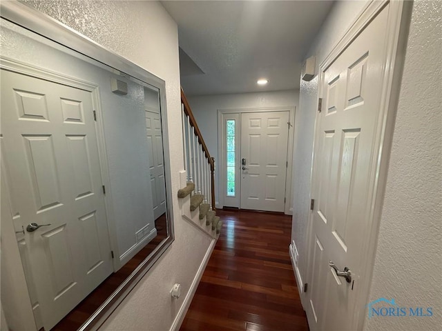 9151 Rolling Hill Rd, Holland, OH 43528 - doorway with wood-type flooring, stairs, a textured wall, and recessed lighting