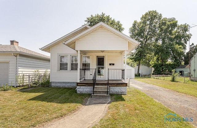 1333 Abbott Ave, Toledo, OH 43614 - view of front of property featuring a porch and a front lawn