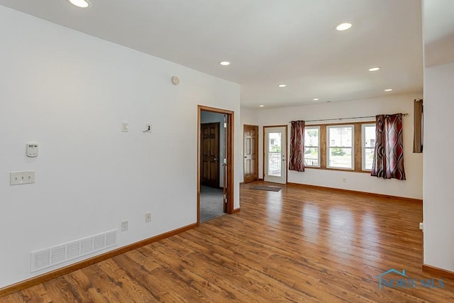 1333 Abbott Ave, Toledo, OH 43614 - spare room with wood finished floors and recessed lighting