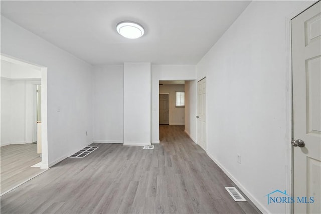 1155 Pinewood Ave, Toledo, OH 43607 - unfurnished room with wood finished floors and baseboards