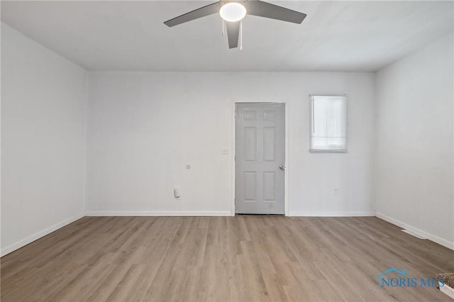 1155 Pinewood Ave, Toledo, OH 43607 - unfurnished room featuring light wood-style floors and ceiling fan