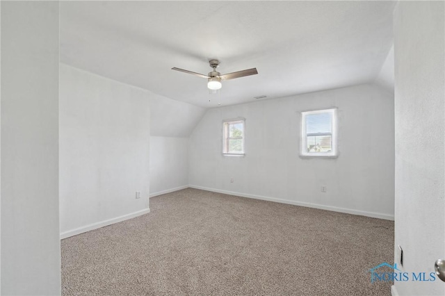 1155 Pinewood Ave, Toledo, OH 43607 - bonus room with lofted ceiling, a ceiling fan, and carpet