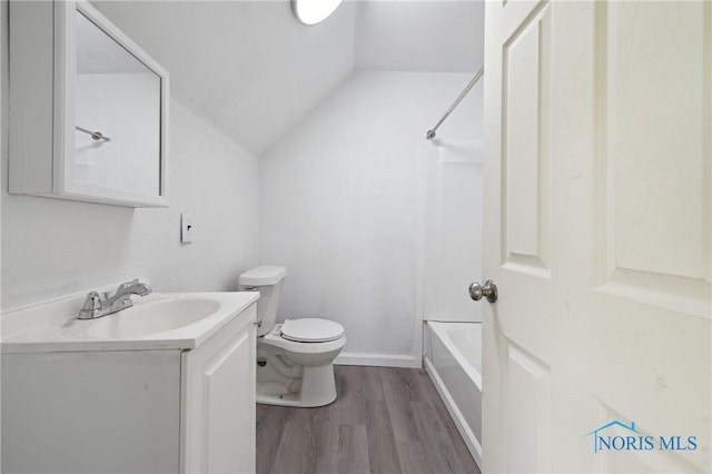 1155 Pinewood Ave, Toledo, OH 43607 - full bath with vanity, wood finished floors, lofted ceiling, and  shower combination