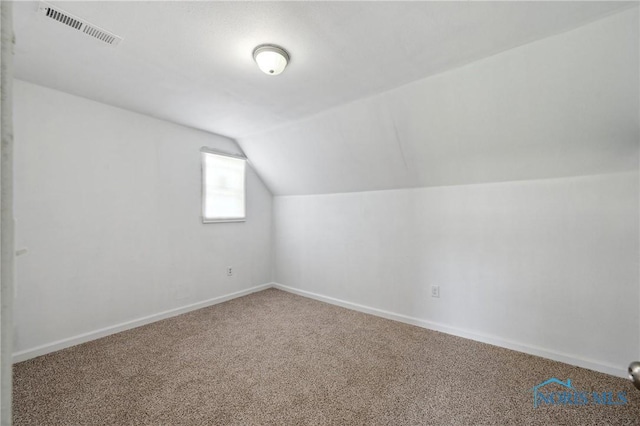 1155 Pinewood Ave, Toledo, OH 43607 - additional living space with vaulted ceiling and carpet