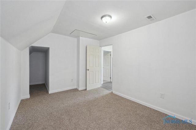 1155 Pinewood Ave, Toledo, OH 43607 - unfurnished bedroom with carpet and vaulted ceiling