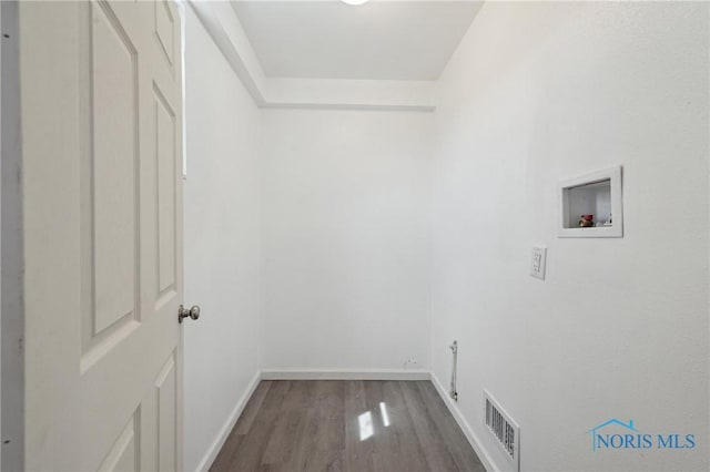 1155 Pinewood Ave, Toledo, OH 43607 - laundry area featuring hookup for a washing machine and wood finished floors