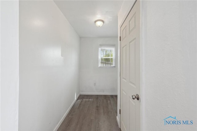 1155 Pinewood Ave, Toledo, OH 43607 - hall featuring dark wood-type flooring and baseboards