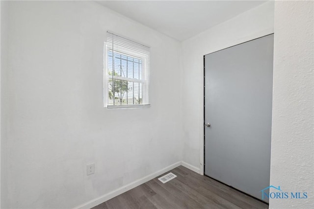1155 Pinewood Ave, Toledo, OH 43607 - spare room with wood finished floors and baseboards