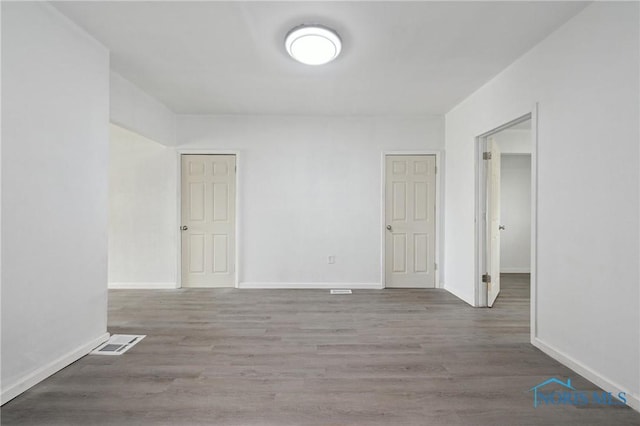1155 Pinewood Ave, Toledo, OH 43607 - unfurnished room with baseboards and wood finished floors
