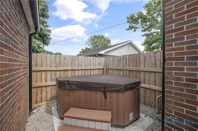 1421 Hurd Ave, Findlay, OH 45840 - view of patio / terrace featuring a hot tub