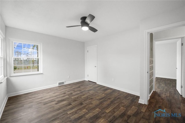 1421 Hurd Ave, Findlay, OH 45840 - unfurnished bedroom with dark wood-style flooring and a ceiling fan