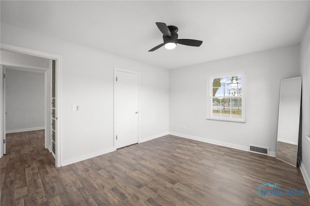 1421 Hurd Ave, Findlay, OH 45840 - unfurnished bedroom with wood finished floors, a closet, and ceiling fan