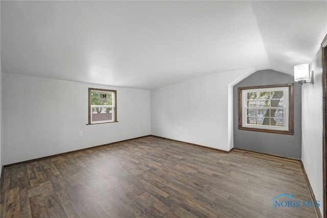 1421 Hurd Ave, Findlay, OH 45840 - additional living space featuring plenty of natural light, wood finished floors, and vaulted ceiling