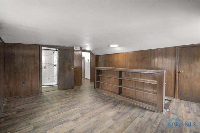 1421 Hurd Ave, Findlay, OH 45840 - empty room with wood walls and wood finished floors