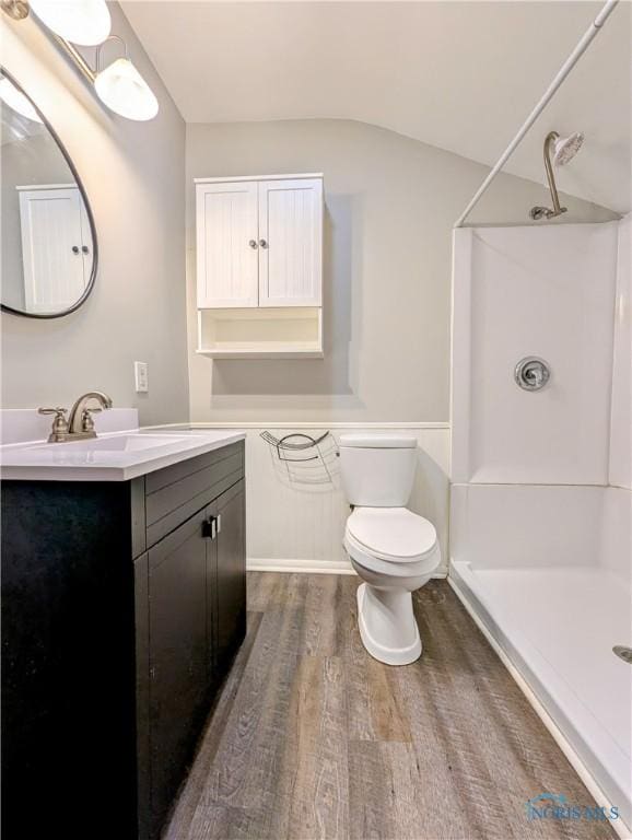 312 S Elm St, Pioneer, OH 43554 - full bath with wood finished floors, a shower, vanity, and lofted ceiling