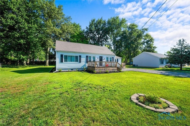 6006 Blossman Rd, Toledo, OH 43617 - view of front of home featuring a wooden deck and a front yard