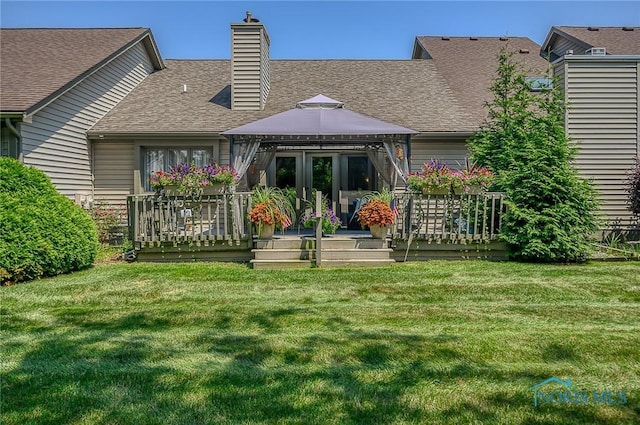 3008 Pleasant Hill Rd Unit 3008, Maumee, OH 43537 - rear view of property with a gazebo, roof with shingles, a chimney, a yard, and a wooden deck