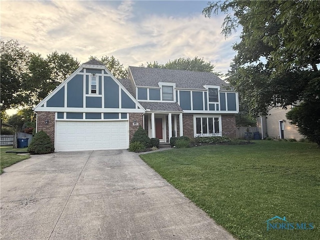 6129 Burrwood Dr, Sylvania, OH 43560 - english style home with brick siding, a front yard, driveway, and a shingled roof