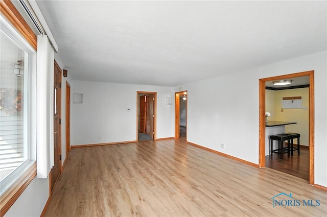 719 S Shannon St, Van Wert, OH 45891 - unfurnished room with light wood-style floors and baseboards