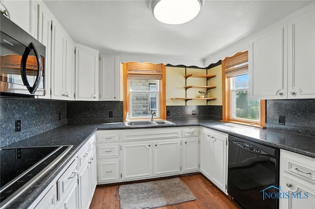 719 S Shannon St, Van Wert, OH 45891 - kitchen featuring black appliances, white cabinetry, dark wood-style flooring, and backsplash