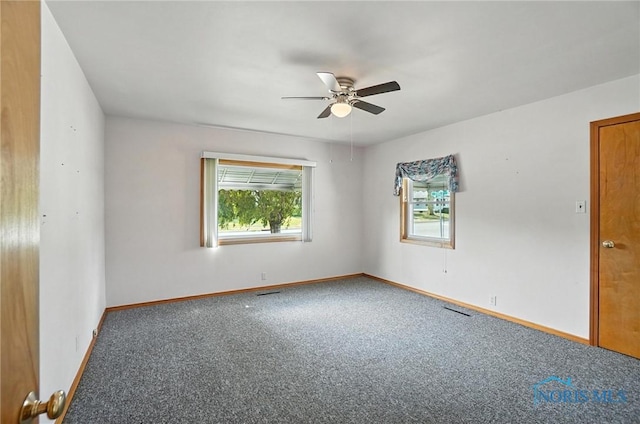 719 S Shannon St, Van Wert, OH 45891 - spare room featuring carpet and ceiling fan