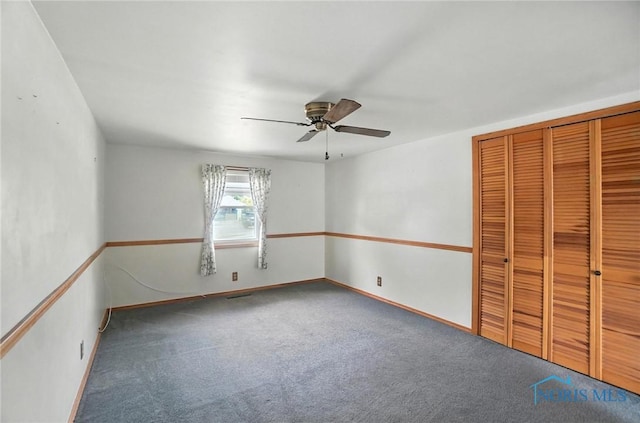 719 S Shannon St, Van Wert, OH 45891 - unfurnished bedroom with carpet flooring, a closet, and a ceiling fan