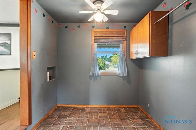 719 S Shannon St, Van Wert, OH 45891 - unfurnished room featuring brick patterned floors and a ceiling fan