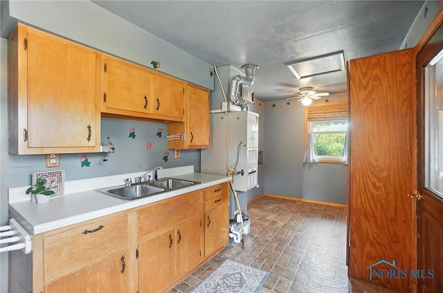 719 S Shannon St, Van Wert, OH 45891 - kitchen featuring brick patterned floors, light countertops, ceiling fan, and stainless steel dishwasher