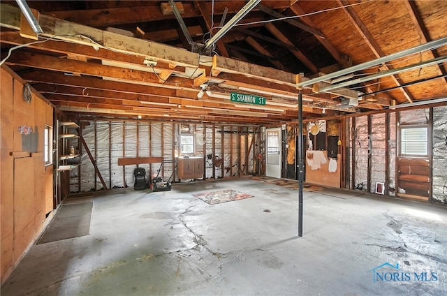 719 S Shannon St, Van Wert, OH 45891 - miscellaneous room featuring electric panel, a garage, and healthy amount of natural light