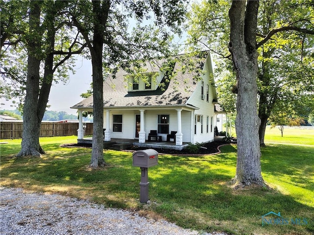 15740 Hill Rd, Defiance, OH 43512 - cape cod-style house featuring covered porch and a shingled roof
