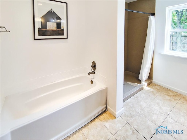 15740 Hill Rd, Defiance, OH 43512 - bathroom with a stall shower, tile patterned floors, and a bath