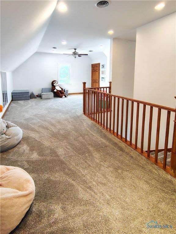 15740 Hill Rd, Defiance, OH 43512 - sitting room with carpet, an upstairs landing, lofted ceiling, recessed lighting, and ceiling fan