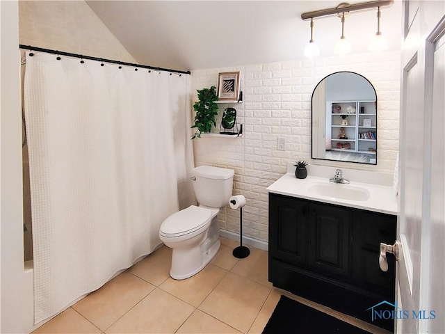 15740 Hill Rd, Defiance, OH 43512 - full bathroom with vanity, tile patterned floors, shower / tub combo with curtain, lofted ceiling, and brick wall
