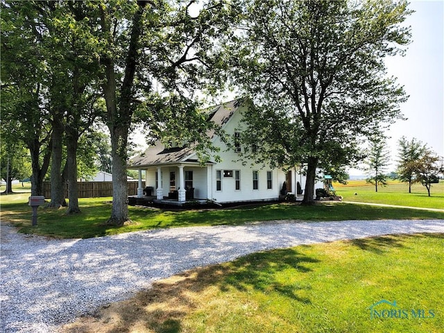 15740 Hill Rd, Defiance, OH 43512 - view of front of home featuring covered porch and gravel driveway