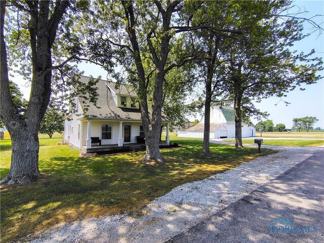 15740 Hill Rd, Defiance, OH 43512 - view of front of house featuring a front lawn and covered porch
