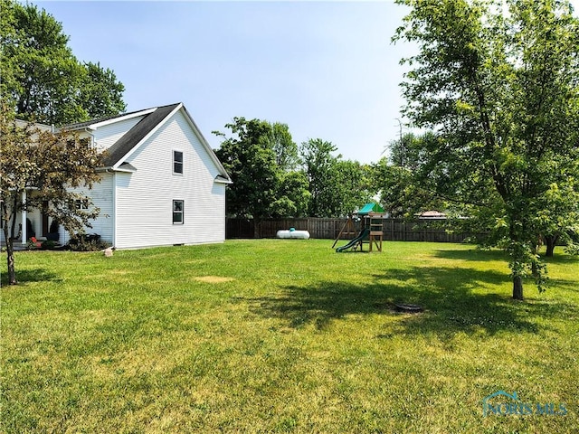 15740 Hill Rd, Defiance, OH 43512 - fenced backyard with a playground