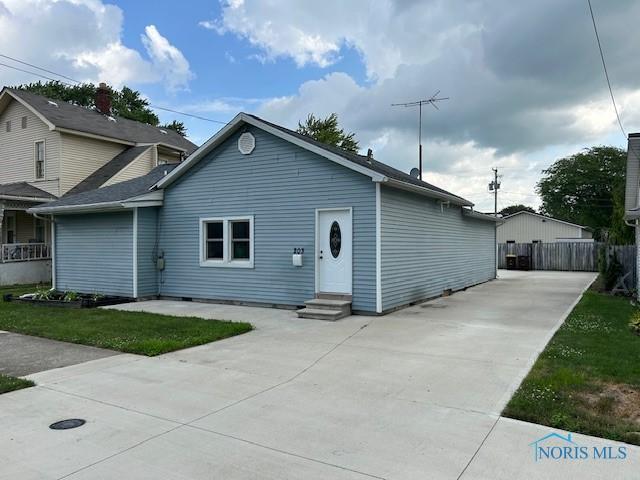 203 S Main, Hicksville, OH 43526 - view of front of property featuring entry steps and driveway