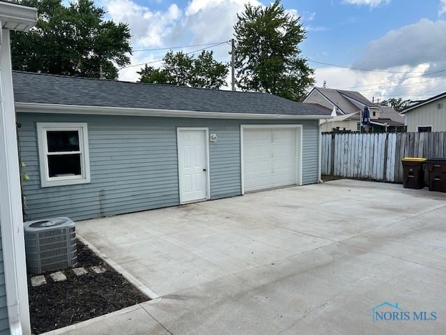 203 S Main, Hicksville, OH 43526 - garage featuring driveway